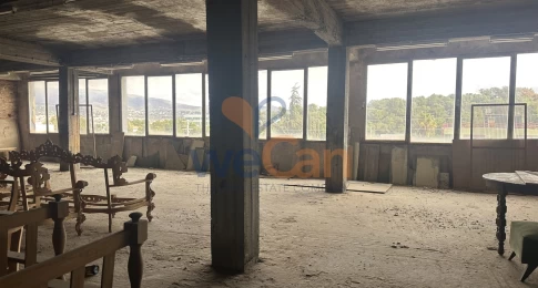 1446028 - Κτήριο επαγγελματικών χώρων επί της Λαυρίου. 1.970 τ.μ., €1.650.000